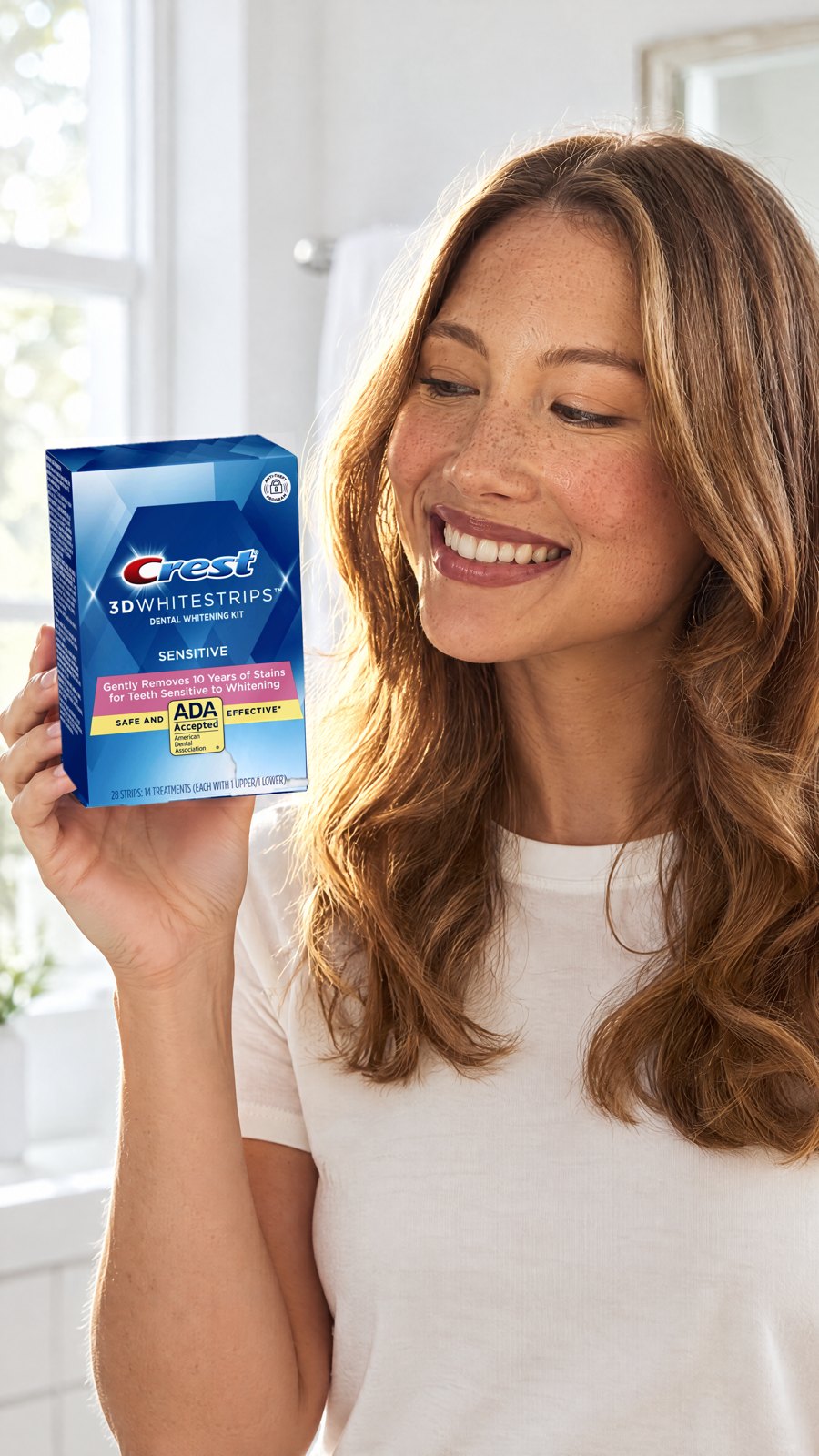 Crest 3D Whitestrips Sensitive Teeth Whitening Kit, 14 Treatments — close-up with model