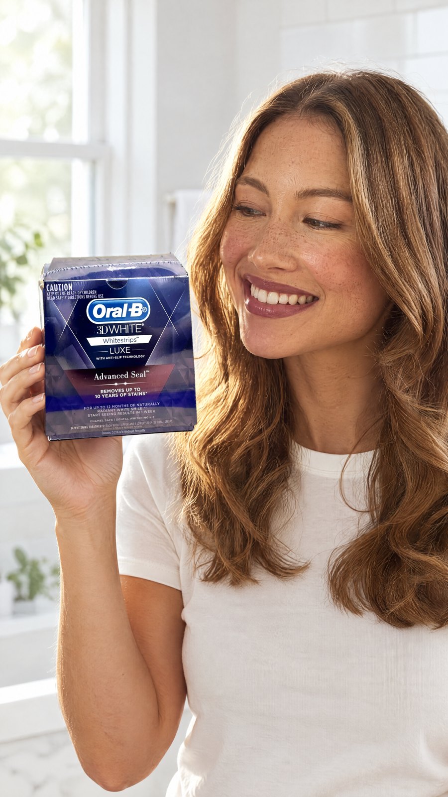 Oral B 3D White Luxe Advanced Seal 14 Teeth Whitening Treatments — close-up with model