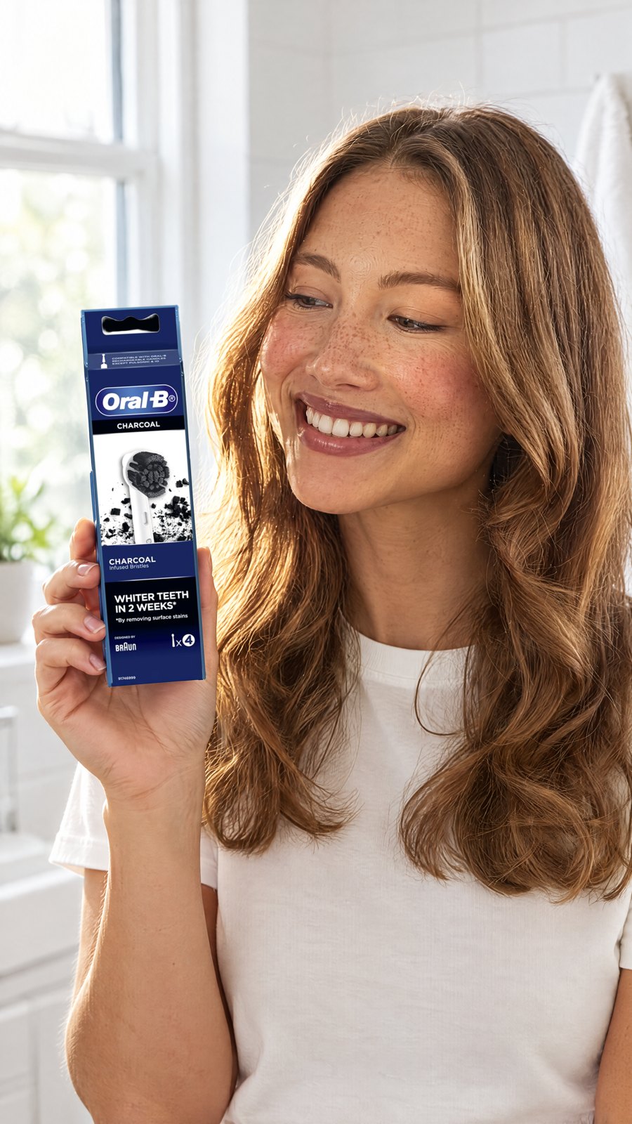 Oral B Power Toothbrush Charcoal Refills 4 Pack — close-up with model
