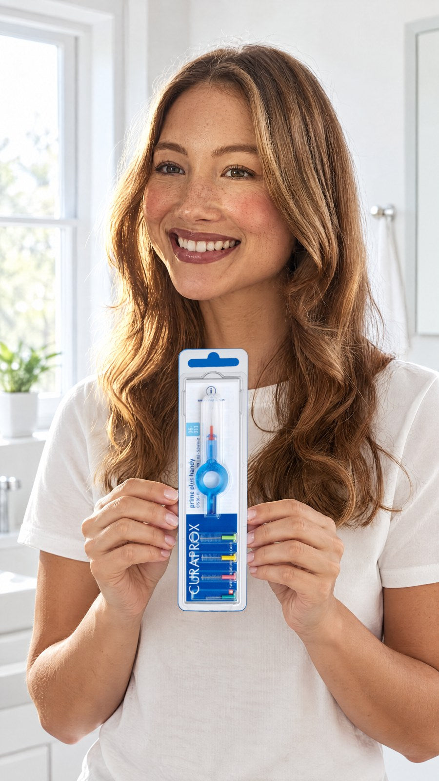CURAPROX - CPS 06 Prime Interdental Brushes 0.6mm (Blue) — held by model