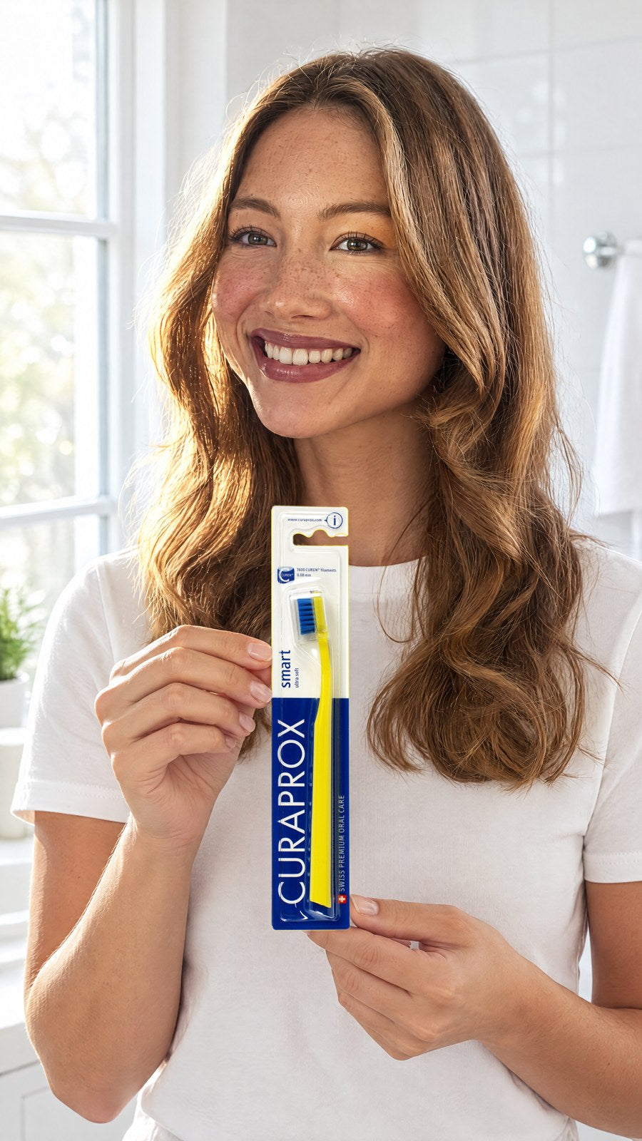 CURAPROX CS Smart Yellow Toothbrush (Pack of 2) — held by model