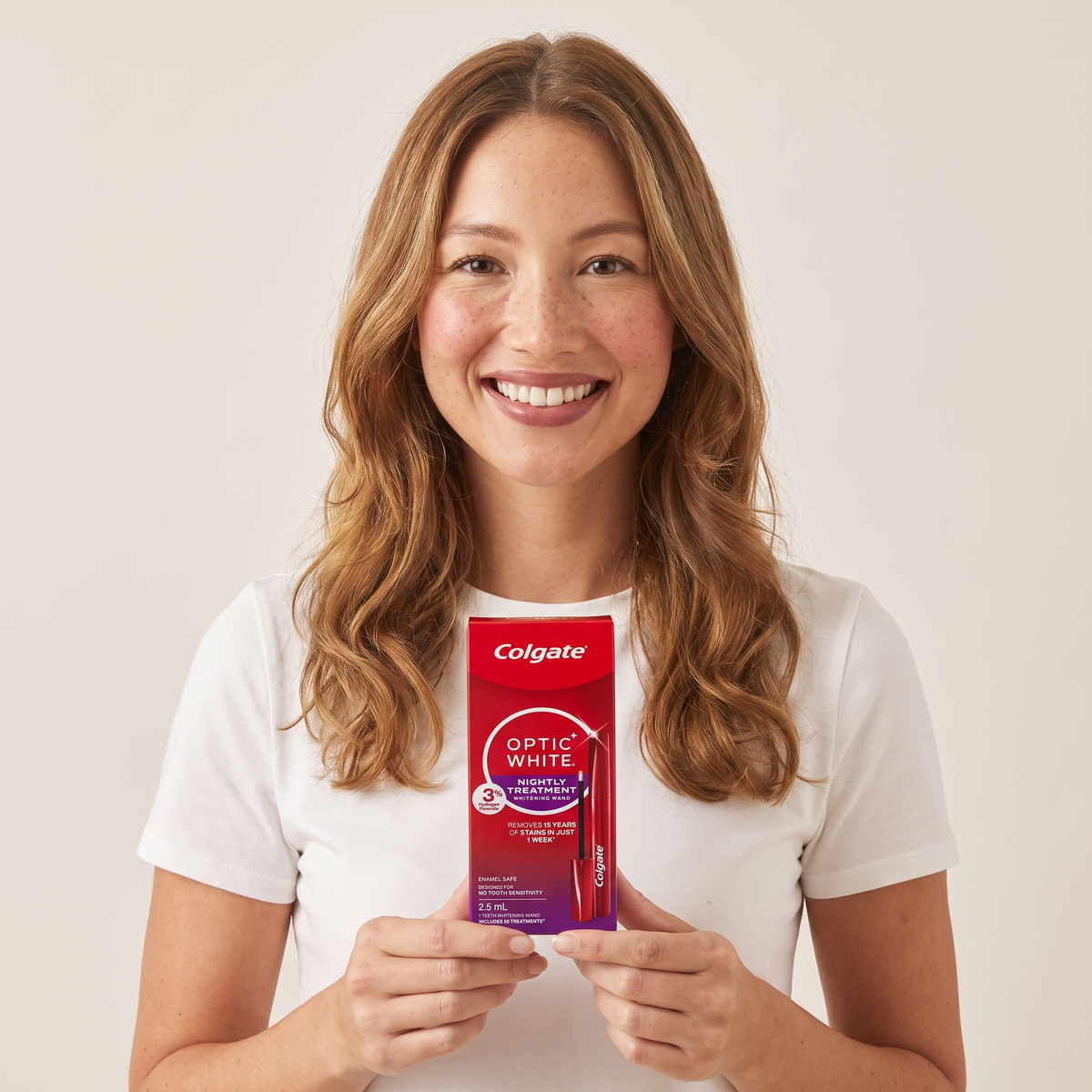 Colgate Optic White wand box in hand