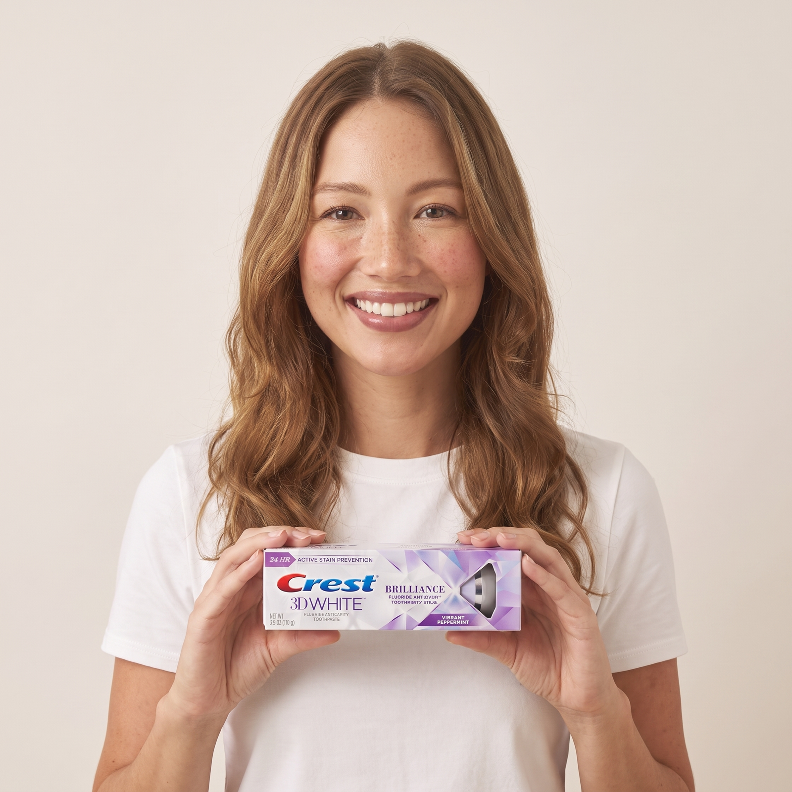 Crest 3D White Brilliance box in hand