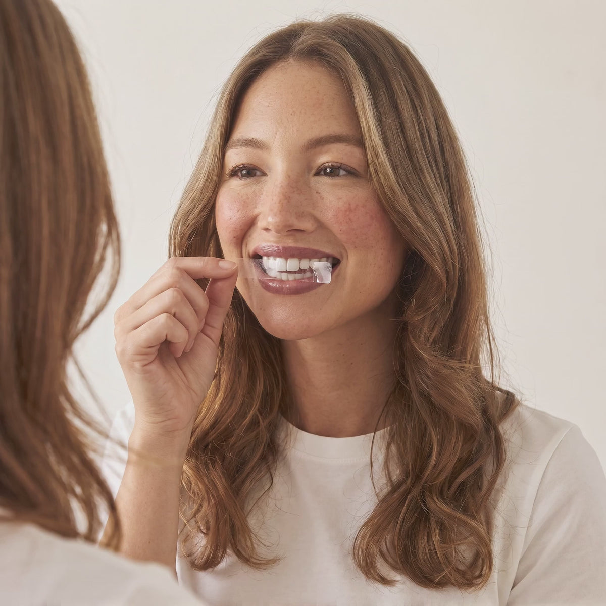 How to apply a clear Crest 3D White whitening strip