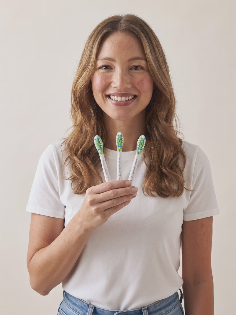 Sonicare W3 heads in hand